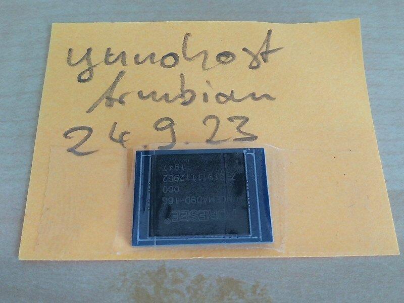 Orange paper with an eMMC taped to it. Written on it "yunohost Armbian 24.09.23".