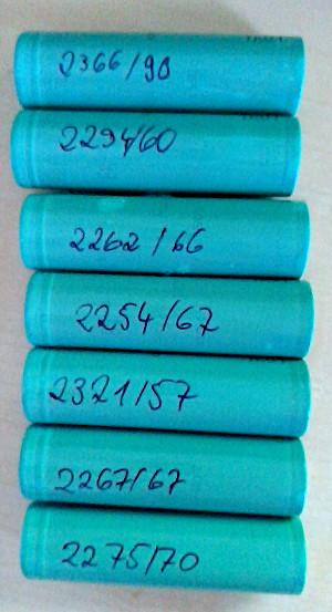 picture of seven battery cells labeled with the capacity in mAh and the internal resistance