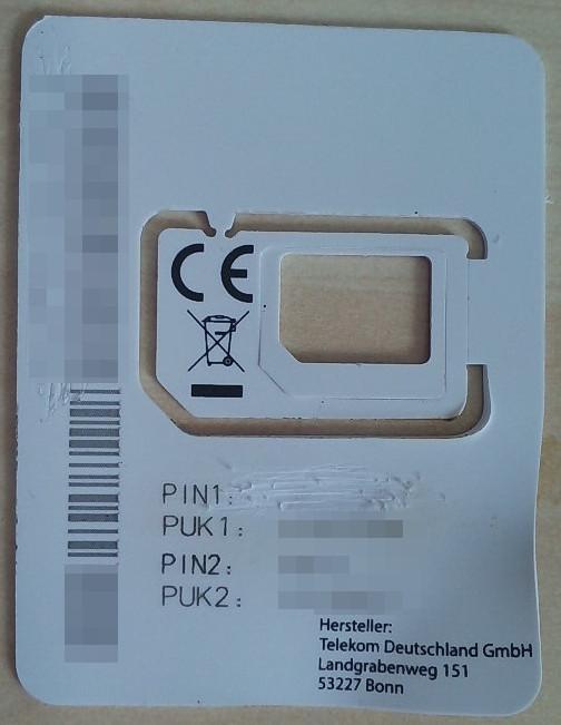 A half credit-card-size plastic card that contained a sim. Sim is missing, pin1 is scratched out (hard work!), rest of confidential information is blurred.